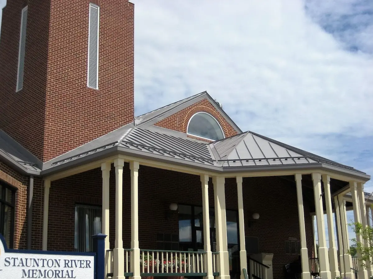 Skilled roofing craftsmen working on a residential roof in Highpoint